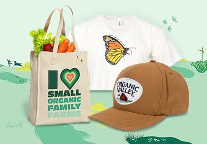 A t-shirt, tote bag, and a hat with Organic Valley branding